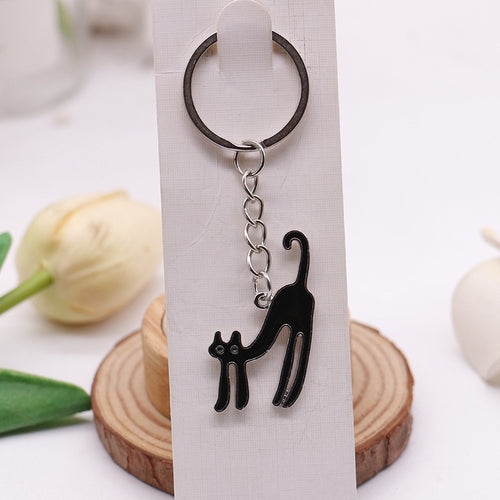 Black Cat alloy illustrated bag charm; bag not included