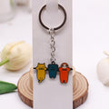 Three Characters alloy illustrated bag charm; bag not included