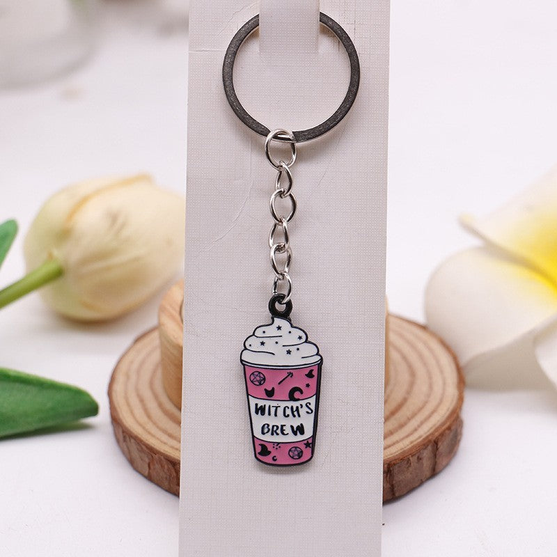 Witch's Brew Cup alloy illustrated bag charm; bag not included