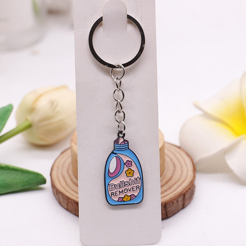 Pink Bottle alloy illustrated bag charm; bag not included