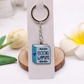 Book Worm illustrated alloy bag charm with split ring and short chain