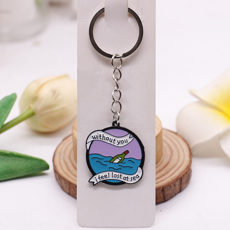Lost at Sea alloy illustrated bag charm; bag not included