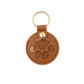One brown paw-window keepsake charm from the matching pair