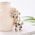 One black-and-white rhinestone giraffe charm from the set of five