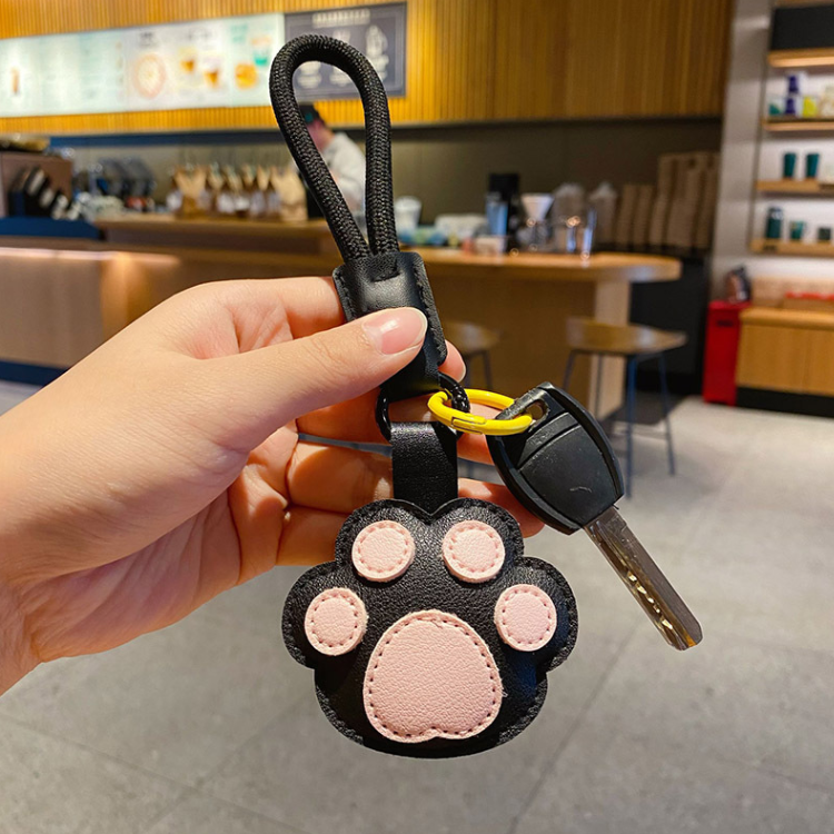 Pink paw loop bag charm shown with keys for scale; keys not included