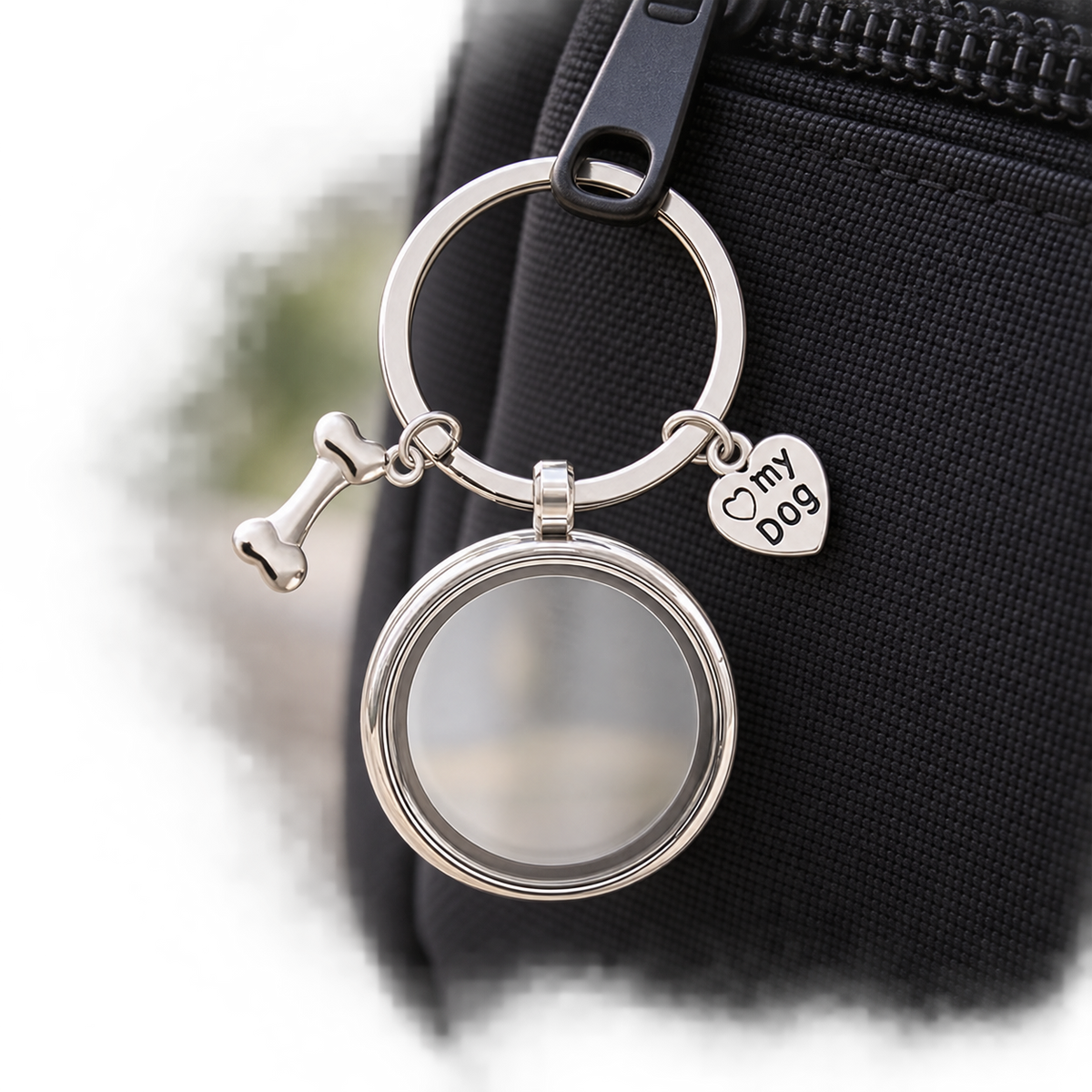 Bone and heart memorial locket charm on a black bag; bag not included