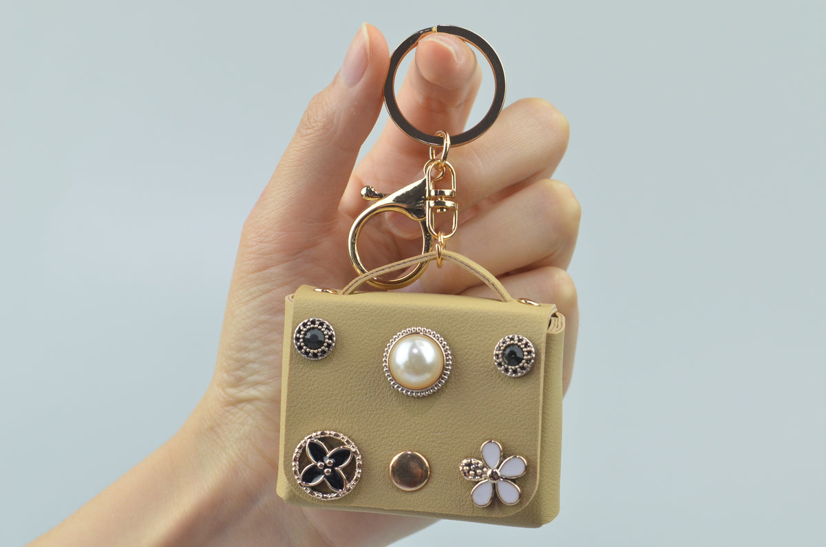 Mini handbag-shaped bag charm — Beige