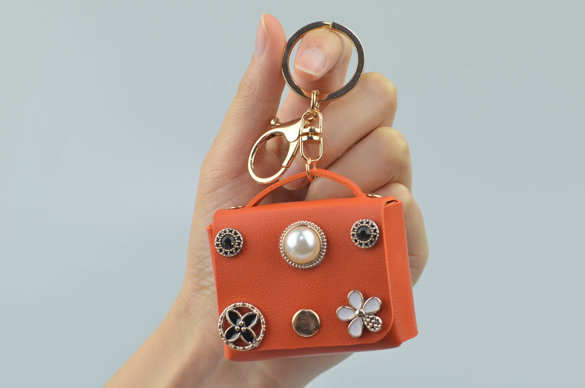Mini handbag-shaped bag charm — Orange