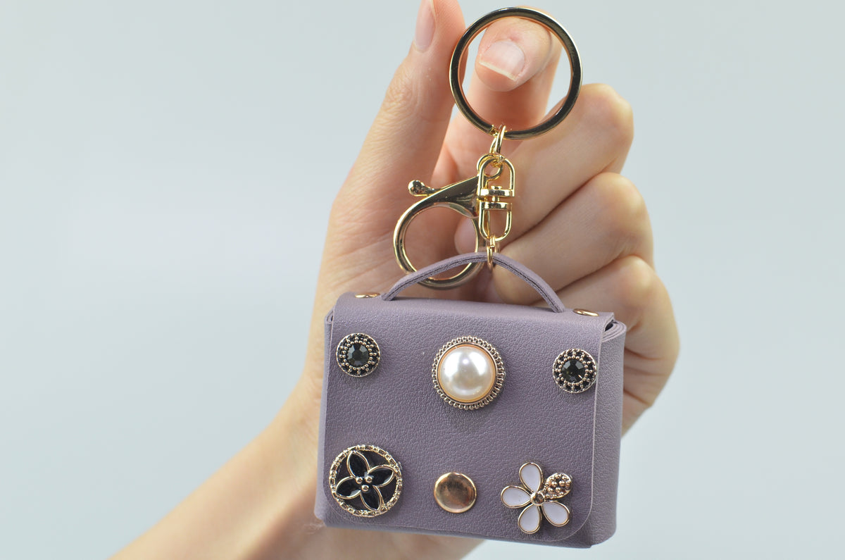 Mini handbag-shaped bag charm — Purple