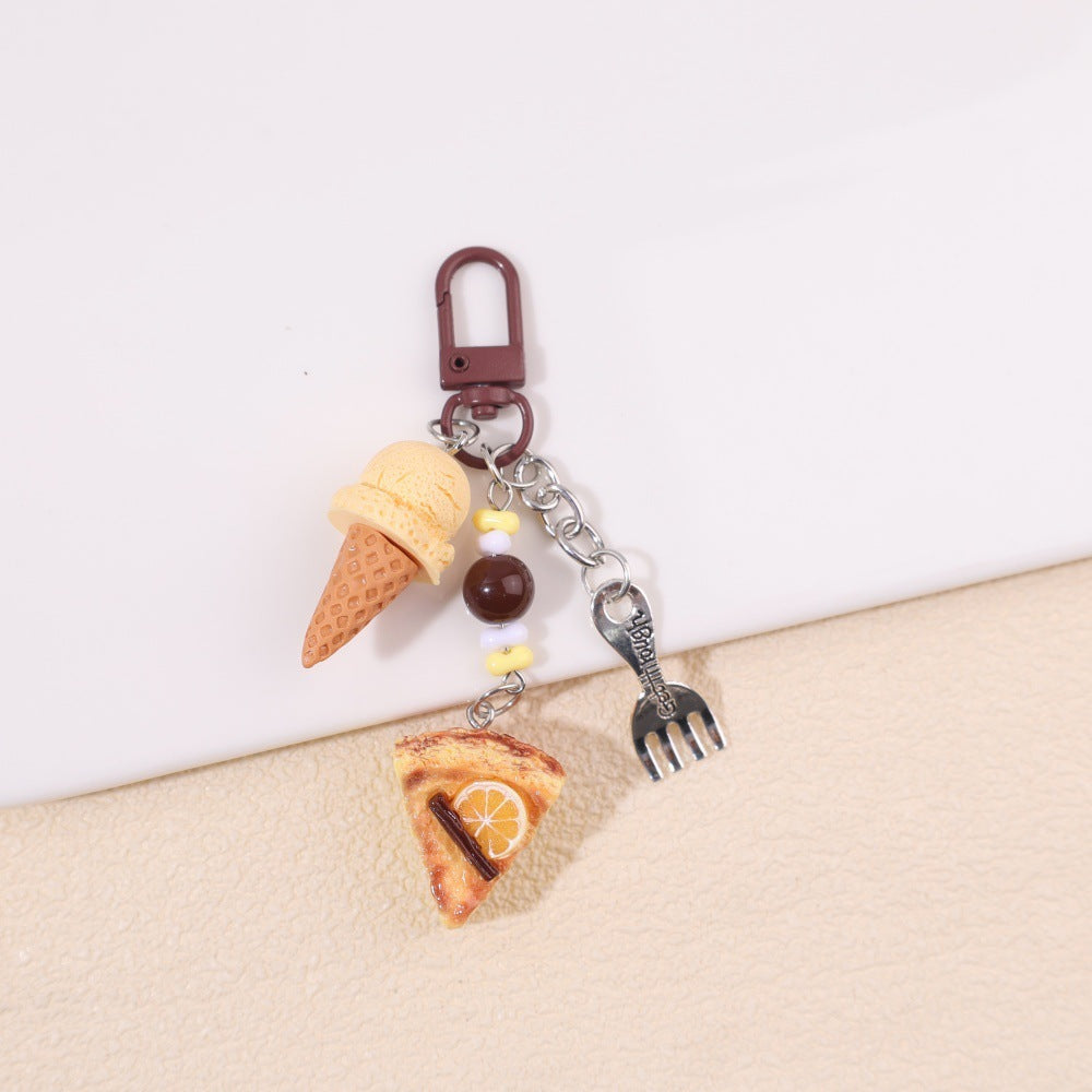 Ice cream and orange cake slice bag charm; supplier product photo