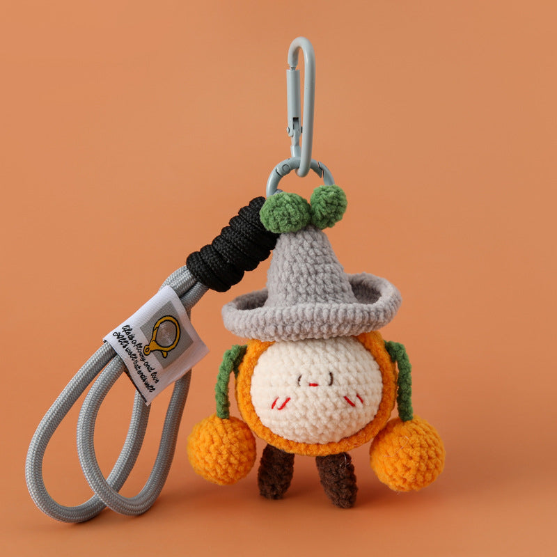 Crochet pumpkin character charm with cord loop