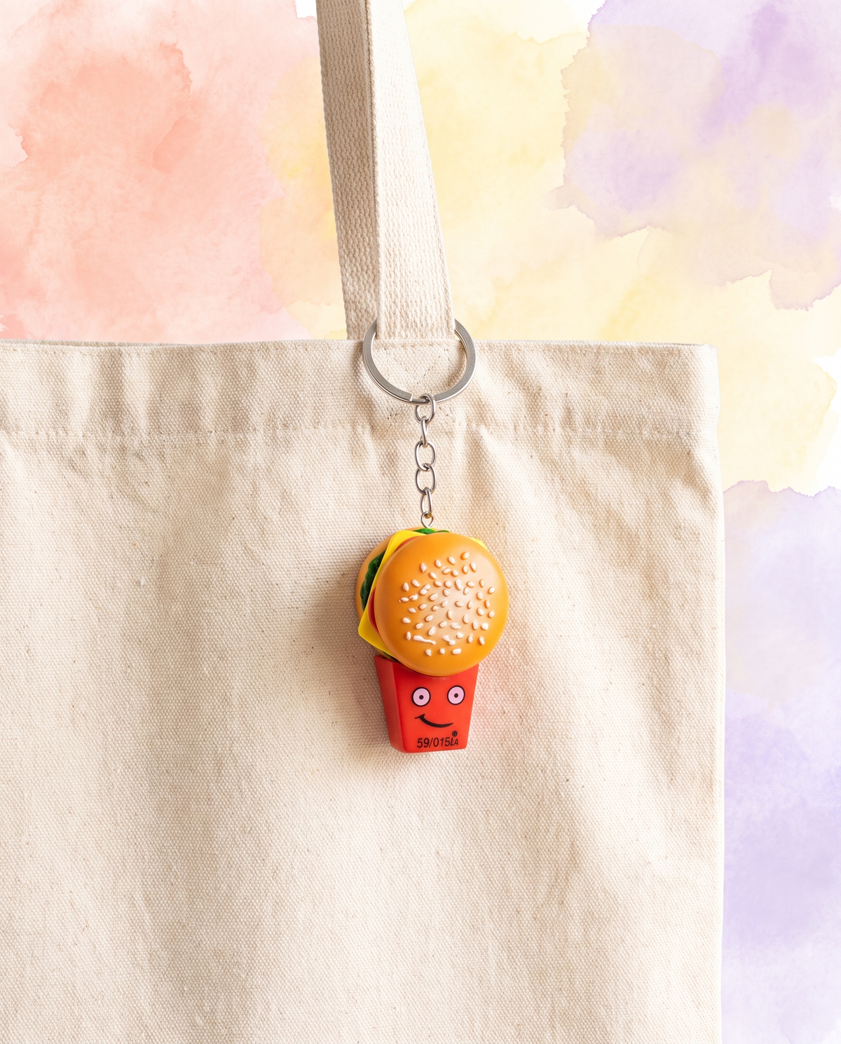 Mini food skewer charm clipped to a natural canvas tote