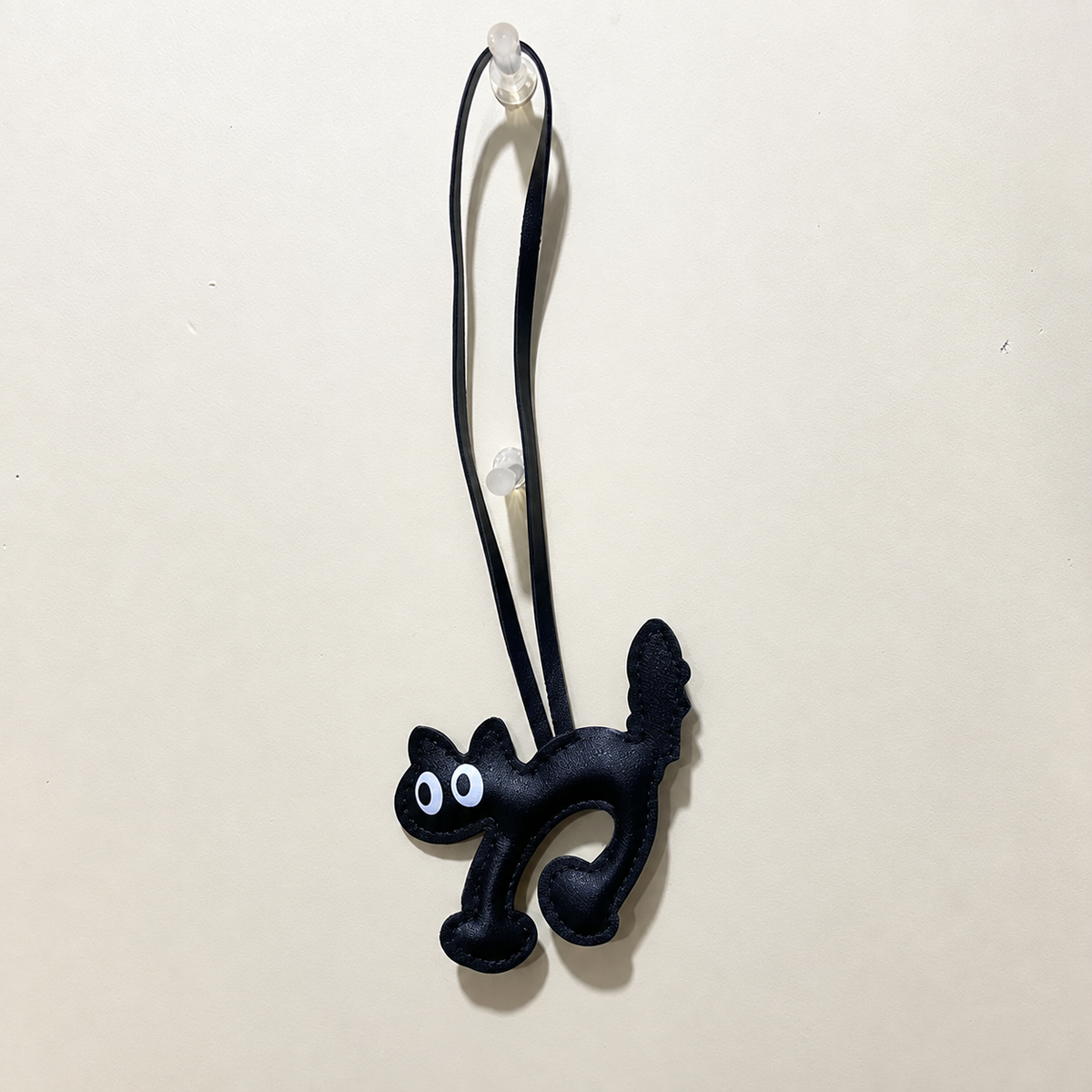 Cat silhouette bag charm — Black Cat; exact source design and loop attachment