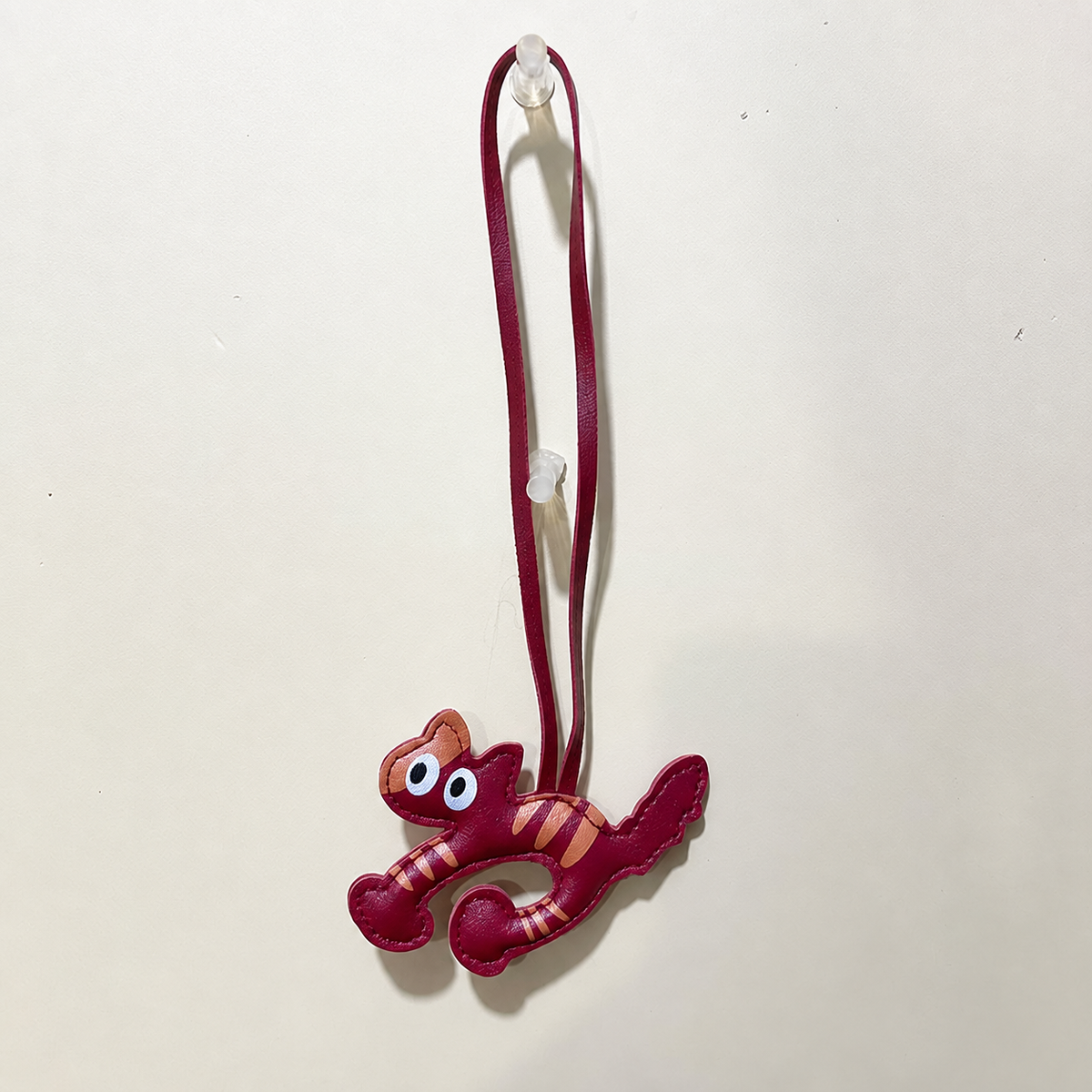 Cat silhouette bag charm — Burgundy Striped Cat; exact source design and loop attachment
