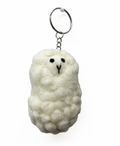 Cream felt sheep keychain, front; source-faithful restored detail