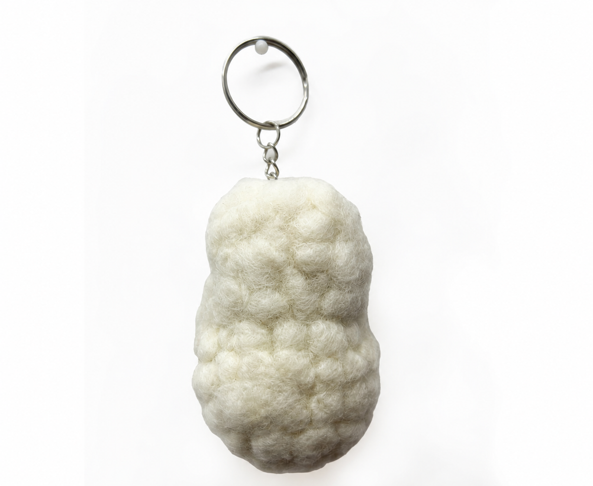 Cream felt sheep keychain, rear; source-faithful restored detail