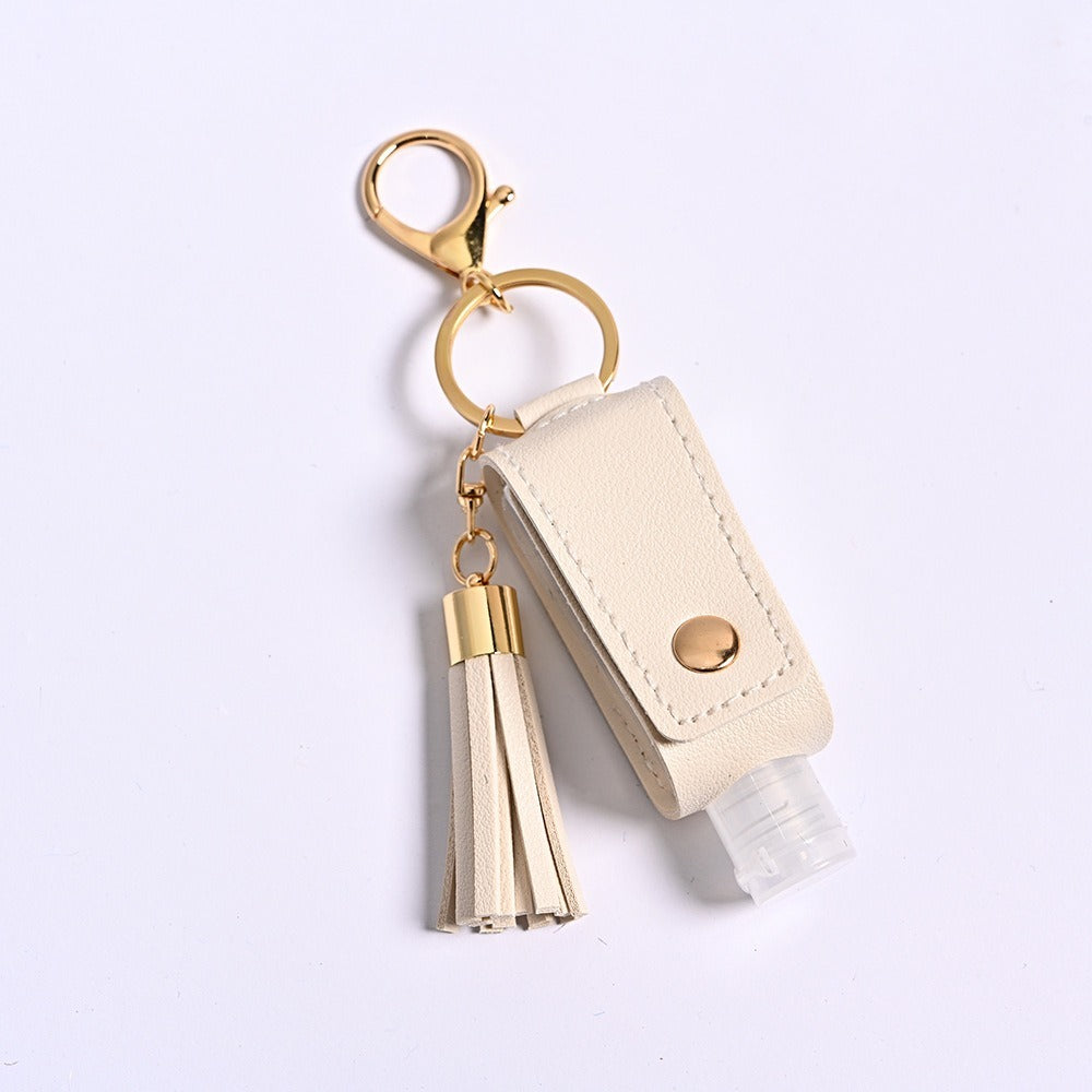 Tassel sanitizer bottle holder — Ivory