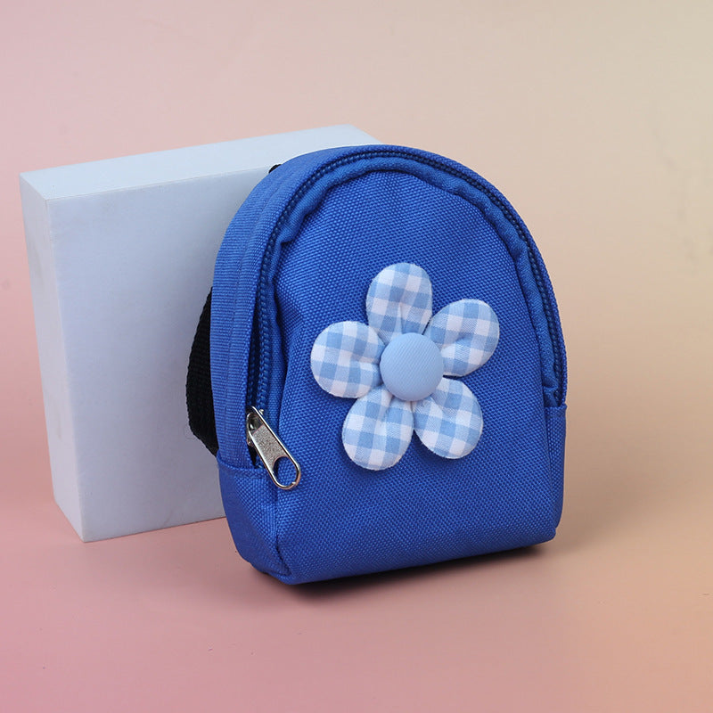 Daisy mini backpack pouch — Blue
