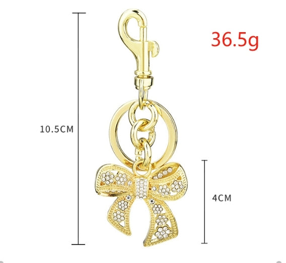 Rhinestone bow bag charm — supplier photograph
