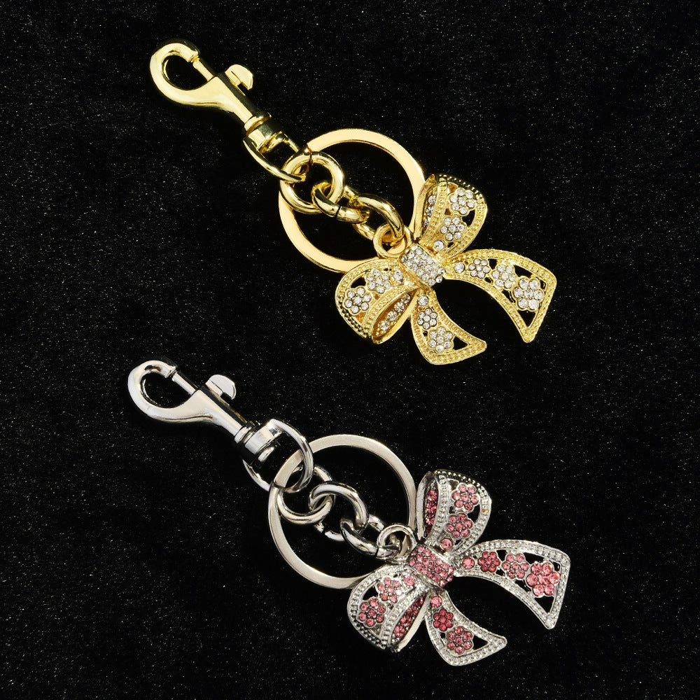 Rhinestone bow bag charm — supplier photograph