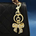 Rhinestone bow bag charm — supplier photograph