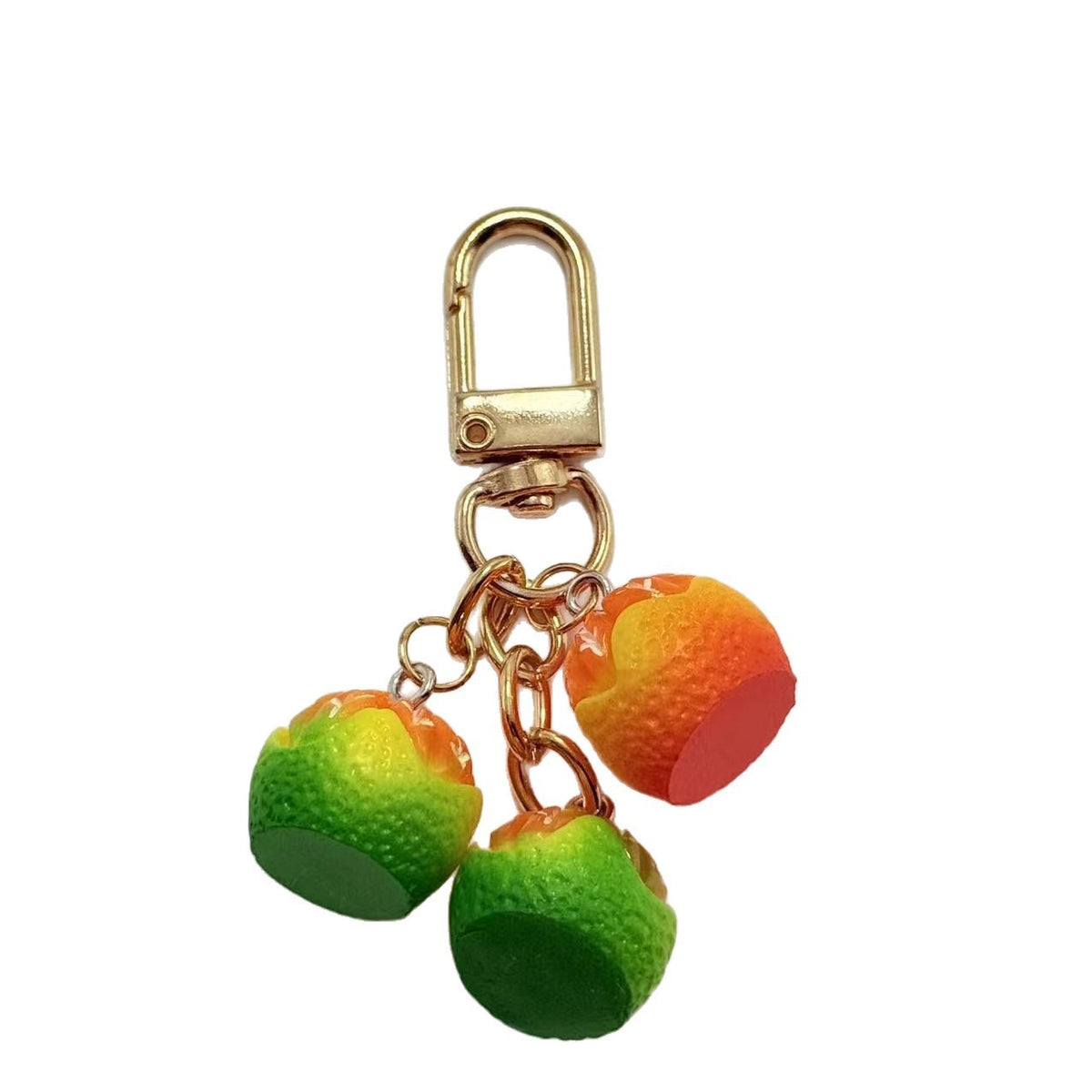 Miniature orange cluster bag charm — supplier photograph