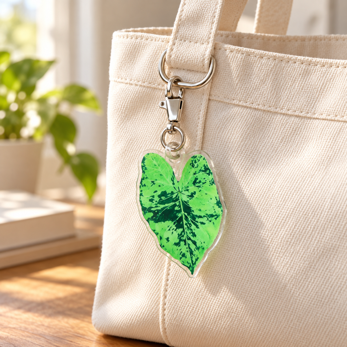 AI lifestyle hero — green leaf acrylic charm on canvas bag