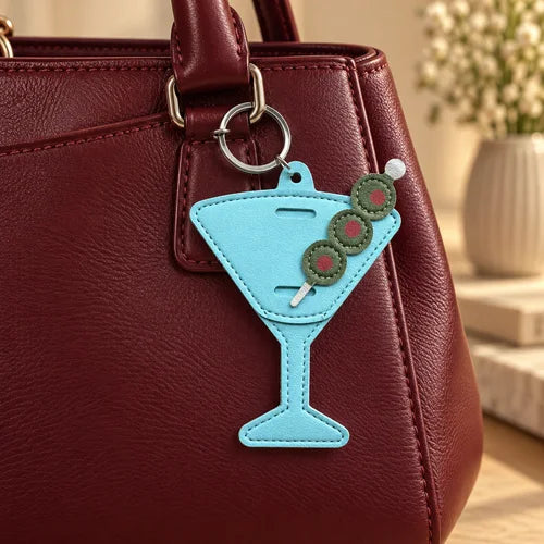 Martini Sunglasses Holder Bag Charm – Blue styled on a handbag